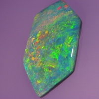 Opal with fancy shape and low dome