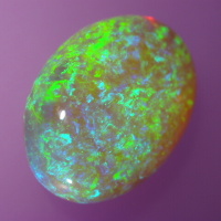 Opal with oval shape and high dome